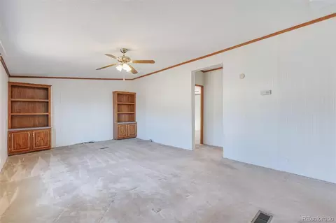 Living - 104 Highland Dr, Howard, CO 81233 photo 6 of 9