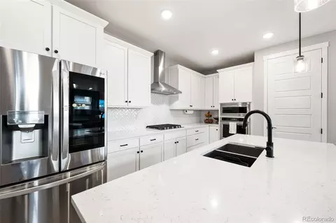 Kitchen - 9630 E 63rd Pl, Denver, CO 80238 photo 2 of 4