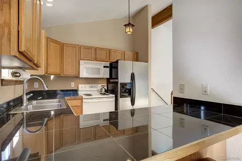 Kitchen - 15431 Toboggan Rd, Pine, CO 80470 photo 4 of 6