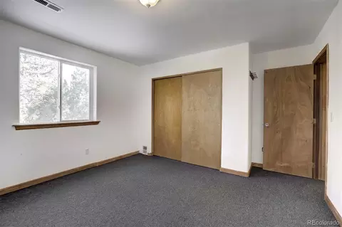 Bedroom - 15431 Toboggan Rd, Pine, CO 80470 photo 4 of 4