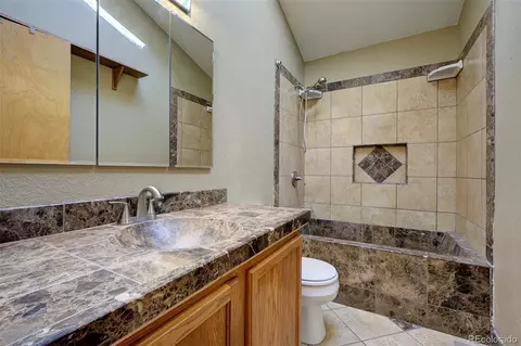 Bath - 15431 Toboggan Rd, Pine, CO 80470 photo 1 of 2