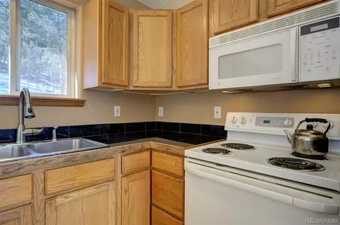 Kitchen - 15431 Toboggan Rd, Pine, CO 80470 photo 1 of 6