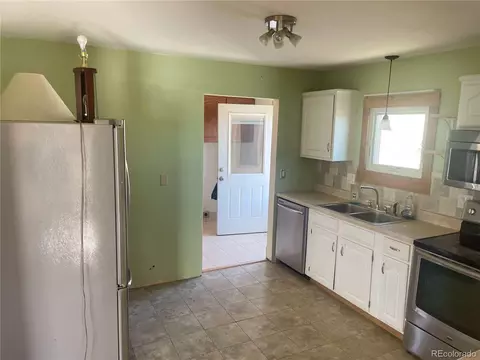 Kitchen - 45005 E Maplewood Dr, Bennett, CO 80102 photo 1 of 2