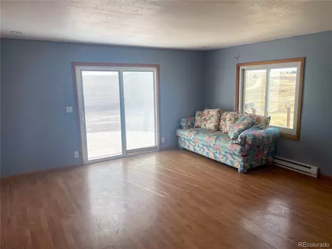 Living - 45005 E Maplewood Dr, Bennett, CO 80102 photo 2 of 2