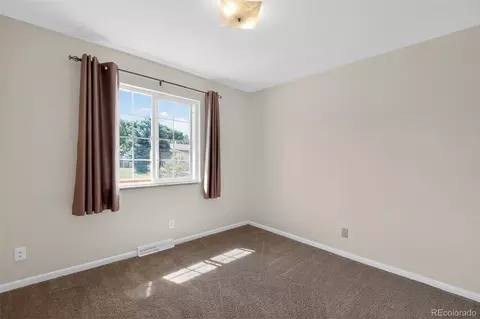 Bedroom - 8245 Ames Way, Arvada, CO 80003 photo 3 of 10
