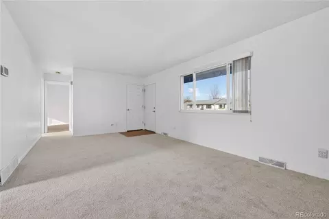 Living - 3700 E 89th Ave, Thornton, CO 80229 photo 2 of 3