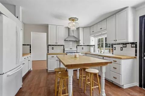 Kitchen - 7492 E Bates Dr, Denver, CO 80231 photo 2 of 3