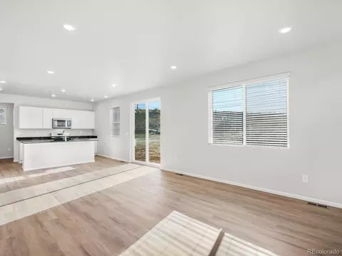 Living - 1206 Spring Creek Dr, Windsor, CO 80550 photo 2 of 3