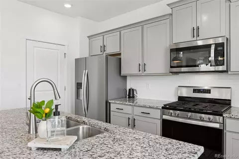 Kitchen - 7434 E 158th Ave, Thornton, CO 80602 photo 6 of 7