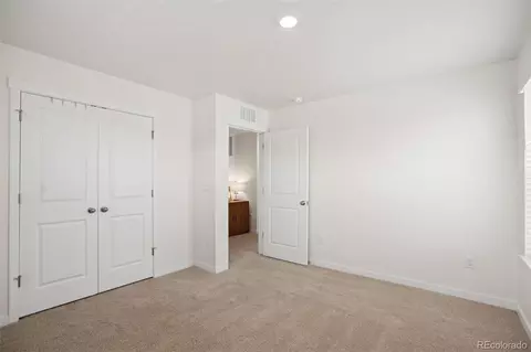 Bedroom - 7434 E 158th Ave, Thornton, CO 80602 photo 2 of 9