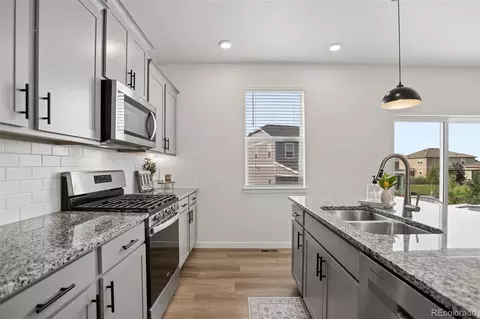 Kitchen - 7434 E 158th Ave, Thornton, CO 80602 photo 5 of 7