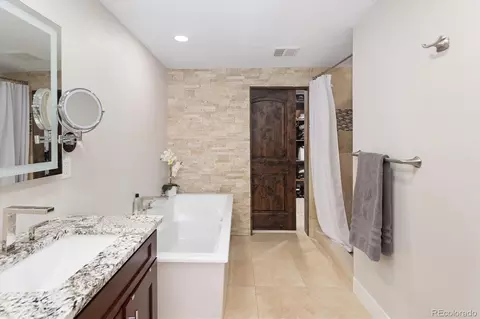 Bath - 7301 E Jarvis Pl, Denver, CO 80237 photo 2 of 6