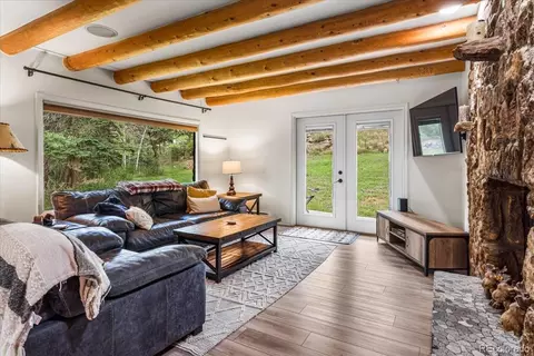 Living - 26955 Stagecoach Rd, Conifer, CO 80433 photo 1 of 2