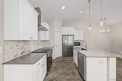 Kitchen - 526 Foxtail Pl, Wiggins, CO 80654 photo 2 of 4