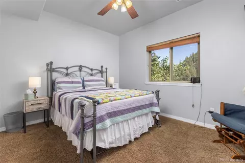 Bedroom - 9552 Pine Springs Dr, Morrison, CO 80465 photo 3 of 3