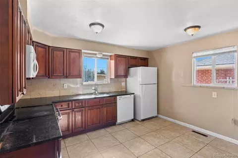 Kitchen - 5085 E 5087 E 34th Ave, Denver, CO 80207 photo 2 of 2