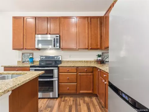 Kitchen - 15526 W 64th Loop #D, Arvada, CO 80007 photo 2 of 7