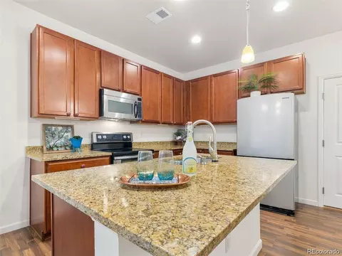 Kitchen - 15526 W 64th Loop #D, Arvada, CO 80007 photo 3 of 7