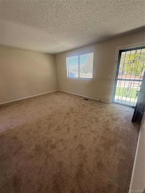 Living - 8090 Chase Dr, Arvada, CO 80003 photo 2 of 3