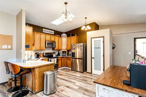 Kitchen - 283 E 3rd Pl, Byers, CO 80103 photo 2 of 2
