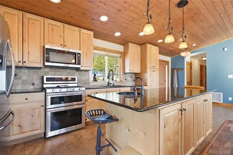 Kitchen - 8790 S Warhawk Rd, Conifer, CO 80433 photo 3 of 5