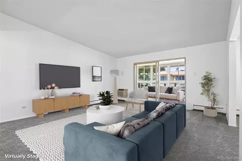 Living - 9655 E Center Ave #9D, Denver, CO 80247 photo 1 of 14