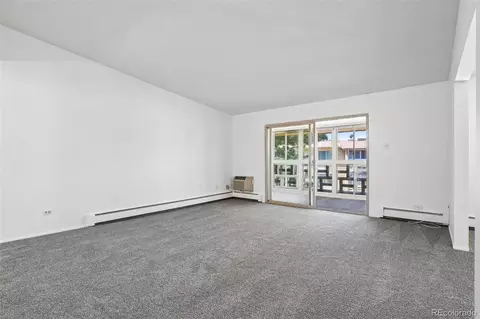 Living - 9655 E Center Ave #9D, Denver, CO 80247 photo 2 of 14