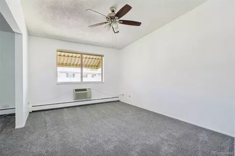 Living - 9655 E Center Ave #9D, Denver, CO 80247 photo 12 of 14