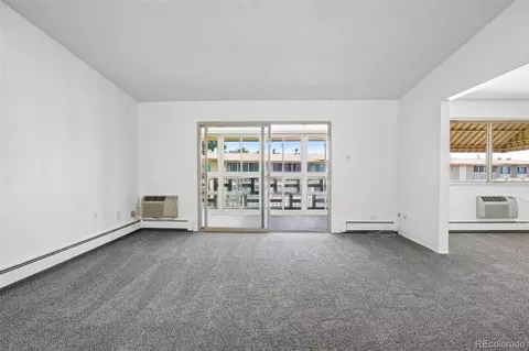 Living - 9655 E Center Ave #9D, Denver, CO 80247 photo 3 of 14