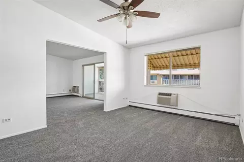 Living - 9655 E Center Ave #9D, Denver, CO 80247 photo 13 of 14