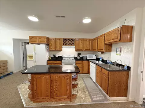 Kitchen - 183 191 E Ave, Limon, CO 80828 photo 2 of 3