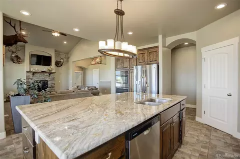 Kitchen - 45425 Wolf Creek Dr, Bennett, CO 80102 photo 4 of 5
