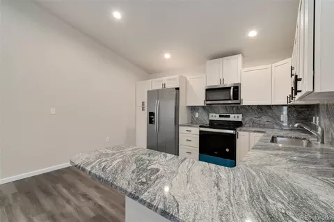 Kitchen - 875 E 78th Ave #72, Denver, CO 80229 photo 2 of 3