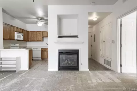 Living - 18284 E Floyd Ave #A, Aurora, CO 80013 photo 2 of 3