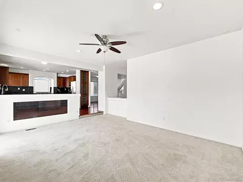 Living - 21438 E 54th Ave, Denver, CO 80249 photo 12 of 16