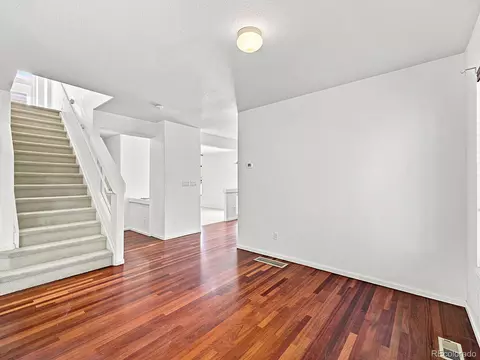 Living - 21438 E 54th Ave, Denver, CO 80249 photo 7 of 16
