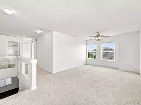 Living - 21438 E 54th Ave, Denver, CO 80249 photo 13 of 16