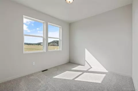 Bedroom - 15690 Atlas Loop, Peyton, CO 80831 photo 7 of 9