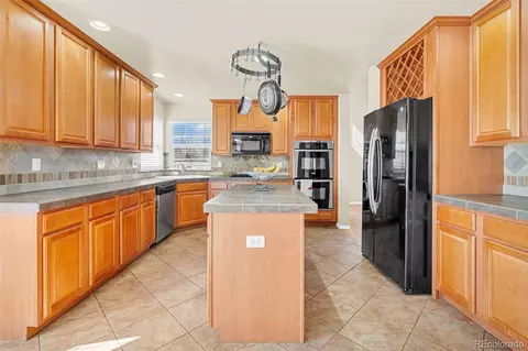 Kitchen - 320 Short Dr, Dacono, CO 80514 photo 2 of 2