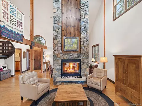 Living - 13892 Douglas Ranch Dr, Pine, CO 80470 photo 5 of 6