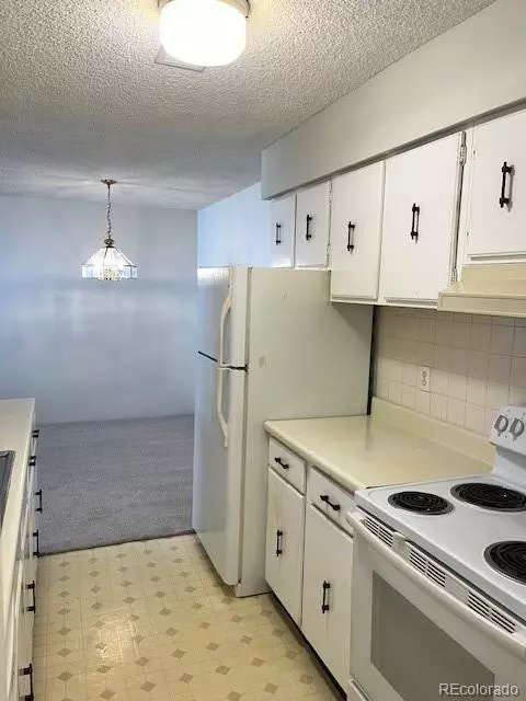 Kitchen - 7755 E Quincy Ave #103D4, Denver, CO 80237 photo 2 of 2