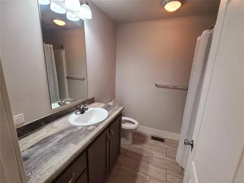 Bath - 8 E 8th St, Flagler, CO 80815 photo 1 of 4