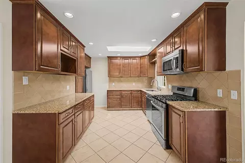 Kitchen - 8413 E Kenyon Dr, Denver, CO 80237 photo 1 of 3