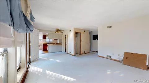Living - 10001 Evans Ave #83A, Aurora, CO 80247 photo 1 of 2