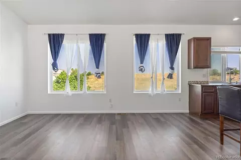 Living - 5571 Killarney St, Denver, CO 80249 photo 3 of 5