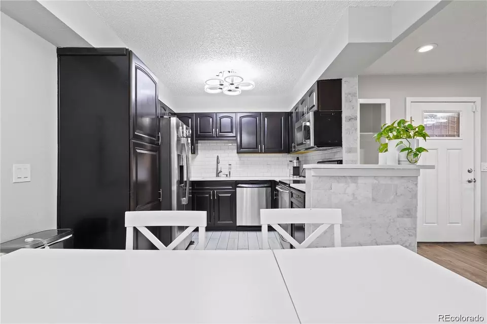 Kitchen - 3345 S Ammons St #5-102, Lakewood, CO 80227 photo 2 of 2
