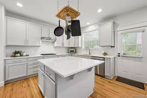 Kitchen - 8775 E 28th Ave, Denver, CO 80238 photo 2 of 3