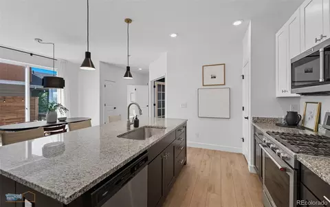 Kitchen - 11571 E 26th Ave, Denver, CO 80238 photo 3 of 3