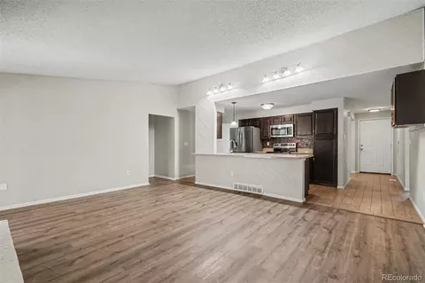 Living - 18891 E Lehigh Ave, Aurora, CO 80013 photo 4 of 6