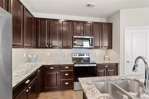 Kitchen - 15526 W 64th Loop #A, Arvada, CO 80007 photo 2 of 3